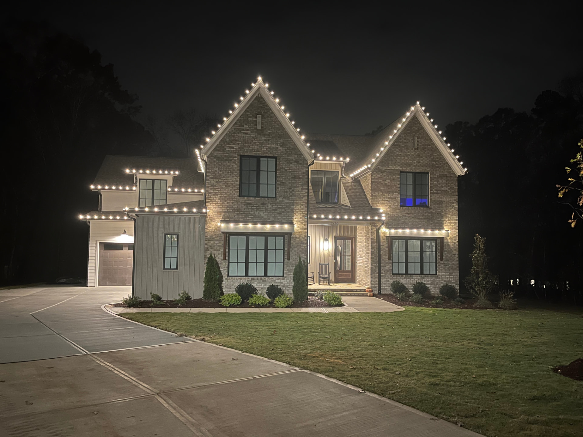 Professional Christmas light installation on a home exterior